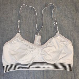 Light grey sports bra.